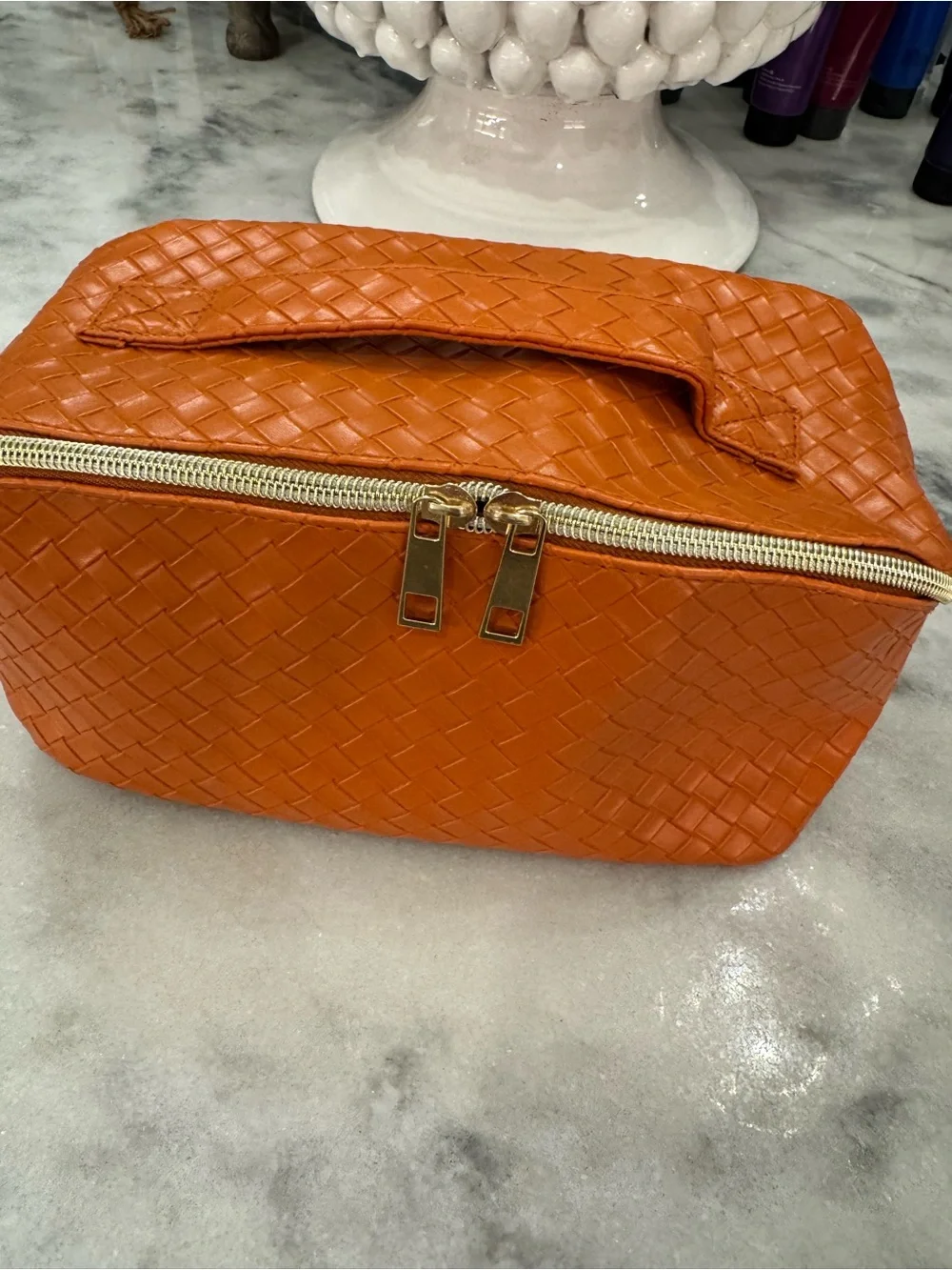 Amazon Orange Woven Cosmetic Bag with Gold Zipper